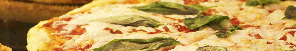 Eating Italian Pizza at Enzo's La Piccola Cucina restaurant in Lawrence Township, NJ.